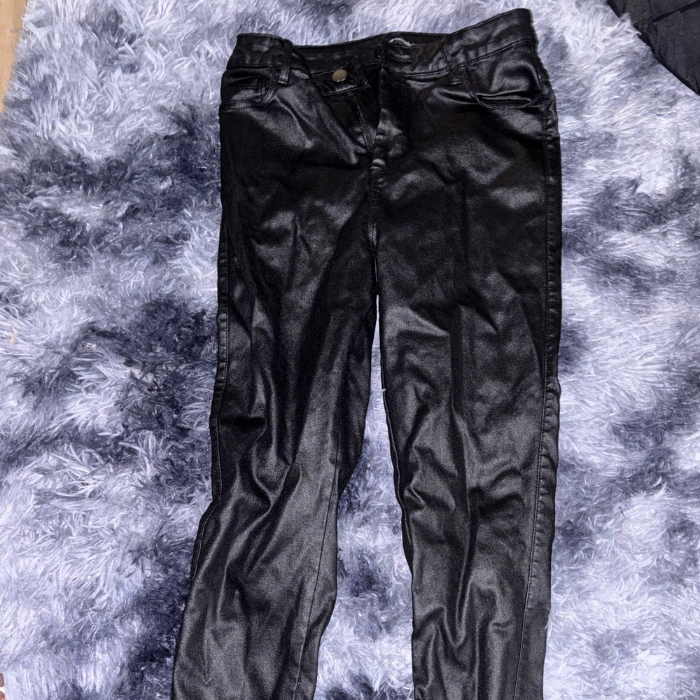 Black leather skinny jean pants